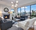 RD Interiors fashioned the home’s interior furnishings. West Elm Champignon chandelier adds modernism to traditional fireplace and cabinetry.