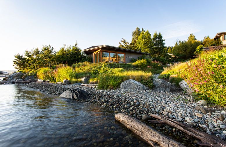 A c.1970s pool house turned pool/guesthouse was pushed back 5 feet to meet regulations and modernized by Seattle architect Jeff Phillips. Having an Asian aesthetic, Pamela requested the Japanese origami-style roof.