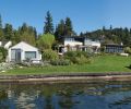 Before image illustrates quarter acre expanse of lawn and failing bulkhead. By replacing man-made “hard” edge with a “living” one, Broadhurst eliminated the destructive effects of ricocheting waves that harm plant life.