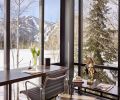 DeGennaro’s office overlooks a snowy landscape framed by structural steel and glass by Fleetwood Windows. African mask is a memento from DeGennaro’s African trip.