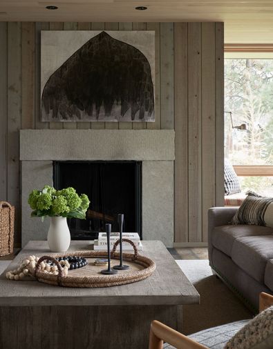The Great Room’s Valdez stone fireplace surround pops against rough sawn cedar and a tongue and groove cedar ceiling.