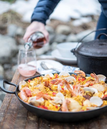 Paella with Chicken, Shrimp and Mussels - a dish inspired by the women’s mother’s self-taught adventures of making paella after purchasing a paella pan during a trip to Europe. Saffron is a must!