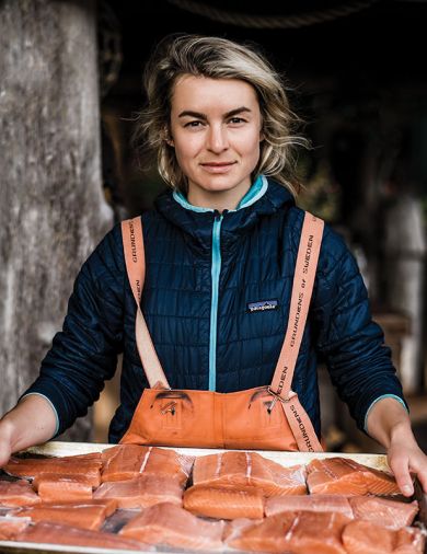 Salmon Sister, Claire Neaton, displays a tray of fresh-caught salmon beautifully filleted and ready for cooking.
