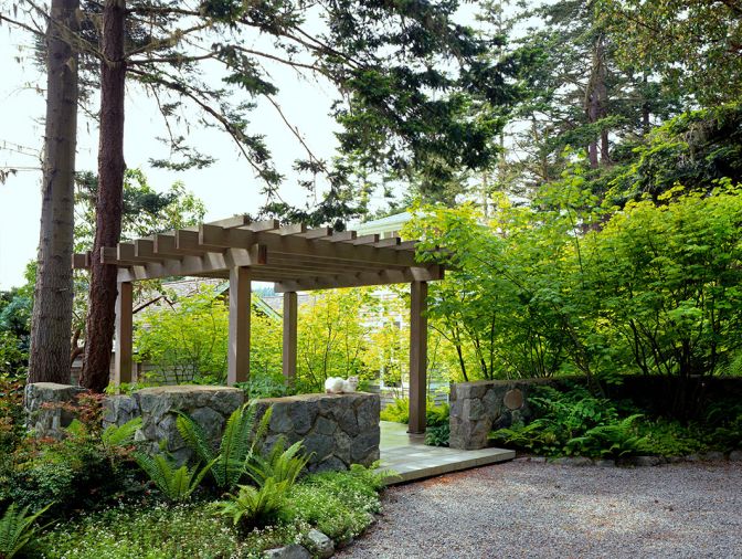 Porte Cochere entrance to property descends through forest of PNW vine maples.