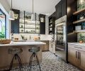 Entertaining center/juice bar’s handsome black cabinets joined by custom metal fabricated glass shelves; Bedrosian Remy floor tile ties to Z Collection Stow Olive mix backsplash tile. Rift cut oak-stained cabinetry; Emtek black pulls.