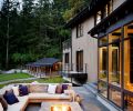 Sierra Pacific windows and Quantum aluminum clad doors add contrast to vertical grain Western red cedar siding, continuing the well-worn look featured in the interior materials giving the illusion the building matches the historic outbuildings that surround it.