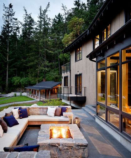 Sierra Pacific windows and Quantum aluminum clad doors add contrast to vertical grain Western red cedar siding, continuing the well-worn look featured in the interior materials giving the illusion the building matches the historic outbuildings that surround it.