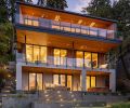 Architects teamed with Riverland Homes to replace an oft-remodeled 1930s home with modern Pacific Northwest design with unobstructed views of Oswego Lake. The team dug into steep hillside to accommodate stacked design. Truncated patio was replaced by a multi-layered landscape by Laura Canfield.