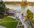 Height of home provides landscape view with transitioning levels to new boat house.