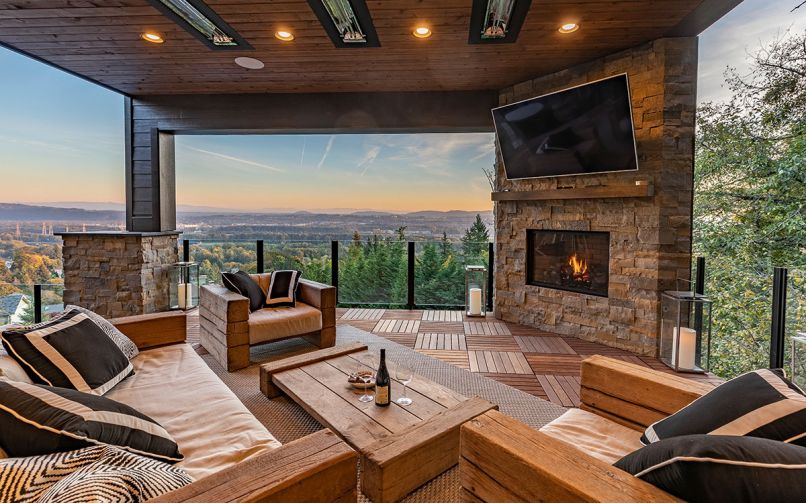 MATERIALS Finn Hill Masonry handcrafted pillars, firebowls, and fireplace from Pioneer Natural thin stone as well as on the repainted house. Ipe Hardwood tiles from Lakeside Lumber installed by Kudla Construction.