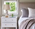 Neutral colors and soft whites grace bedrooms and bathrooms. Lee Industries headboard from J Garner Home.