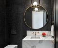 Powder room Calacatta ESD quartz wrapped hanging sink. Winfield Thybony wallpaper adds dramatic backdrop for Four Hands pendant and Elegant Lighting mirror. Brass inlaid flooring.