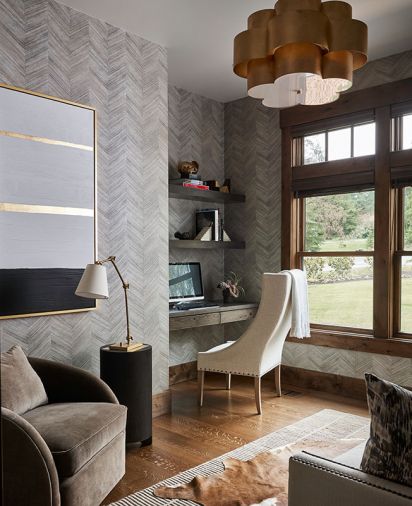 Guest bedroom doubles as interchangeable offices crowned by elegant Visual Comfort Pendant with gild Arabelle Hanging Shade and grounded by Surya cowhide rug. CR Laine Chloe desk chair’s sensual lines opposite luxury sleeper sofa with Tempur-Pedic mattress.