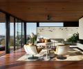 The lounge features B&B Italia Awa table between yellow leather Artifort chairs. Custom Corian and wool sofa beneath Lukeke birds by Jacombe & Rutecki. Nelson Pear Lotus lamps.