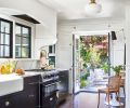 A backyard entry and pantry door occupied the space where the Blue Star range from Eastbank Appliances and a trio of Marvin windows now provide an excellent cooking experience with better light. The dramatic arch disguises top-of-the-line Vent-A-Hood.