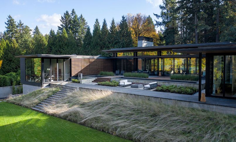 Lakeside Lumber Japanese-inspired Shoji screens add layers to building’s façade – from entry walkway to patio exterior gym wall. Firepit-heated Gloster furnished seating area flanked by 2.ink Studio sword fern plantings. Mari Design window coverings.