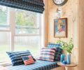 The Roman window shade fabric matches the bench in guest room lookout. Paint: Farrow & Ball De Nimes inspired by workwear.