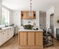 Plank flooring from United Tile covers the main floor. Prince inserted Blue Star appliances in the kitchen’s perimeter cabinetry, painted ‘Simply White’ by Sherwin Williams.