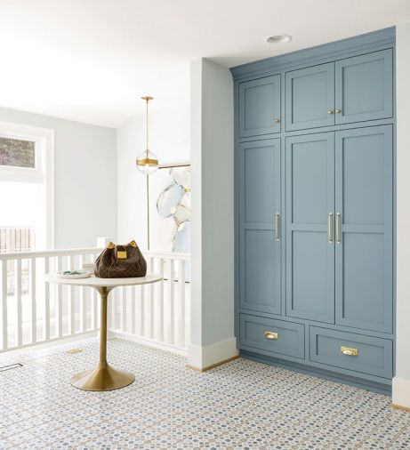 This high traffic area features a Bedrosians ceramic tile floor in a small Meditteranean pattern that doesn’t overwhelm the eye. The new pantry provides almost as much storage as the rest of the kitchen’s previous cabinets combined. The family uses this room adjacent to the kitchen as a “drop zone” for groceries and other sundries, while pets appreciate the cool tile floors for napping.