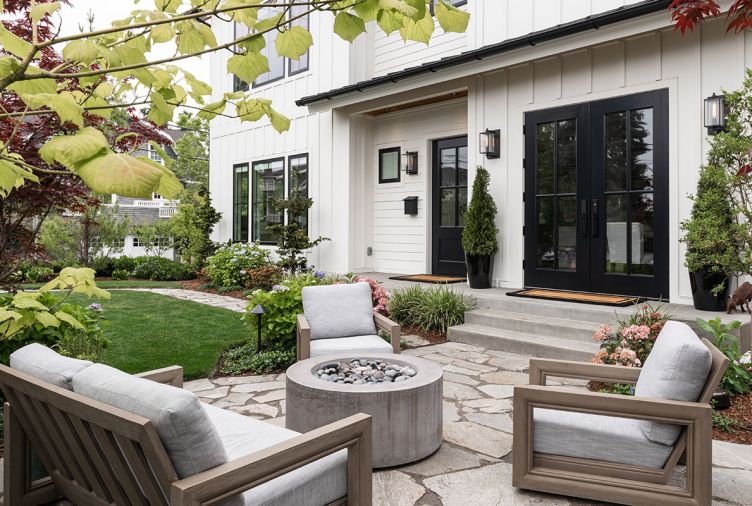 ate landscaped area located off formal dining room through custom French doors built by Amish carpenters. Restoration Hardware furnishings set on natural Vancouver Island quarried stone patio. Fire pit keeps visitors cozy in cooler weather as outdoor speakers keep guests entertained all year long.