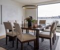 West Elm chandelier crowns existing dining furniture overlooking Elliott Bay.