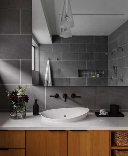 Double vanity features California Faucets and super white polished PentalQuartz countertop.