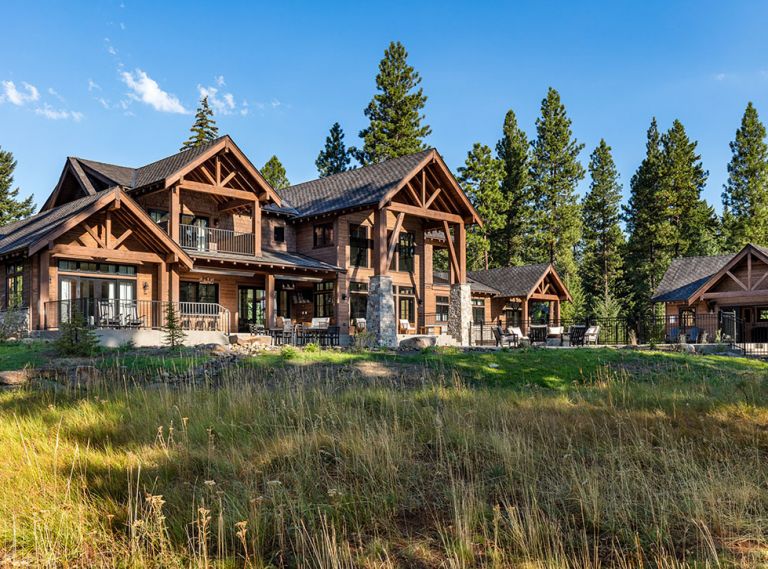 Richard A. Fisher Architects and White Label Interiors worked with contractor Chad Stevens to create a vacation rental on two lots in Suncadia, WA, which could easily accommodate thirty people, or several families, at once. Rustic materials, like heavy timber and stone, were mixed with modern detailing to strike the right balance in the natural setting.