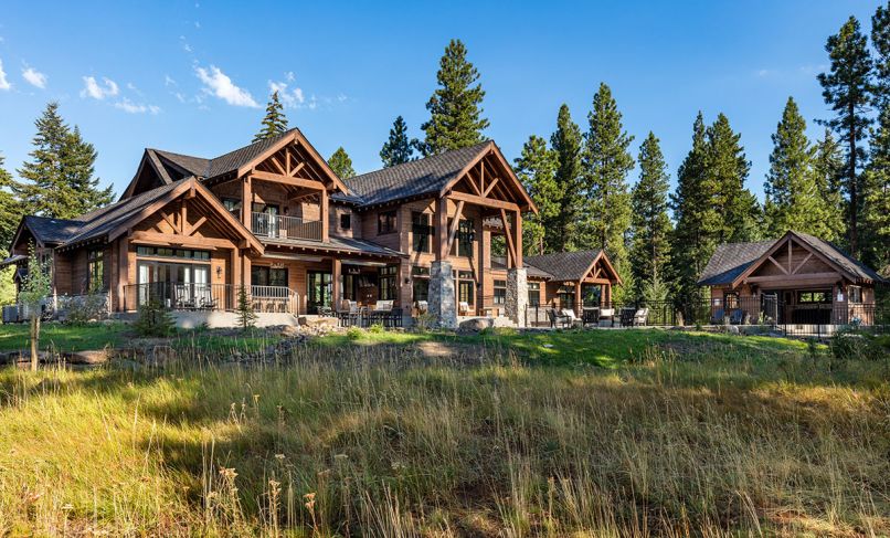 Richard A. Fisher Architects and White Label Interiors worked with contractor Chad Stevens to create a vacation rental on two lots in Suncadia, WA, which could easily accommodate thirty people, or several families, at once. Rustic materials, like heavy timber and stone, were mixed with modern detailing to strike the right balance in the natural setting.