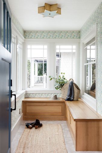Cherry Creek Windows & Doors supplied new Marvin windows. House of Harris wallpaper adds cheer to space. Three unique storage cabinets by Superior Cabinets. Visual Comfort star-shaped brass light fixture, reiterated in living room, also from Designer Furniture Galleries at Seattle Design Center.