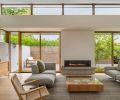 Cherry Creek Windows & Doors supplied Marvin Ultimate windows and doors. Spark Modern Fires fireplace. Soft Dream sofa and chaise by Flex Form flank Bensen wood coffee table. De La Espada sideboard left. Cantilevered sideboard right. Benjamin Moore Winter White throughout.