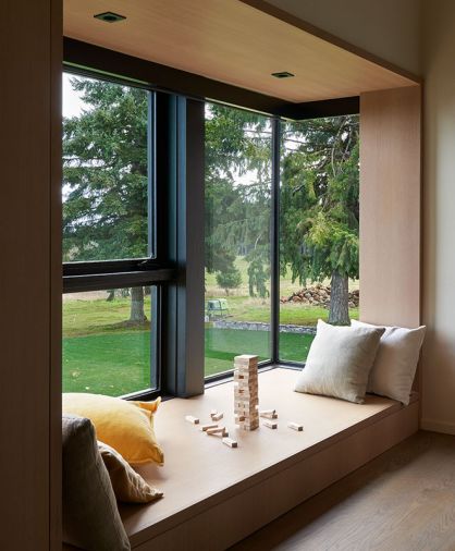 Kids’ bay window with white oak UDS cabinet.