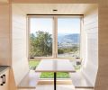 Telford + Brown designed breakfast nook as minimal perch to enjoy landscape. Bloomster and RCC executed the design to perfection, reiterating white-stained hemlock.