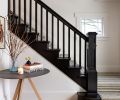 Original and existing elements like the entryway staircase and light fixture were preserved to maintain character but updated to reflect a more casual and playful ambiance.