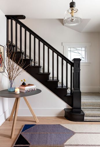 Original and existing elements like the entryway staircase and light fixture were preserved to maintain character but updated to reflect a more casual and playful ambiance.