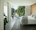 Primary Bedroom with Parallel Bed, designed by Jeffrey Bernett, Nicholas Dodziuk for Design Within Reach. Hidden closet in wall now houses workout room. Park lounge chair and ottoman by Niels Bendtsen, from Bendtsen.