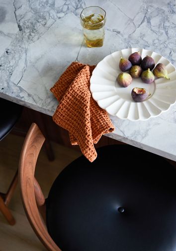 Dolomite stone covers the counter and backsplash. “The stone is beautiful and incredibly durable in our experience, and has really exceeded our expectations,” says Eric. “That was something that we were a bit worried about: we didn’t want to have to walk around the condo with a little cleaning rag all day.”