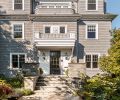 Gone are odd rooflines and choppy exterior with conflicting styles, unified by a Colonial New England style, specific proportions, tall rectangular windows, stained shingles and a whole new third floor.