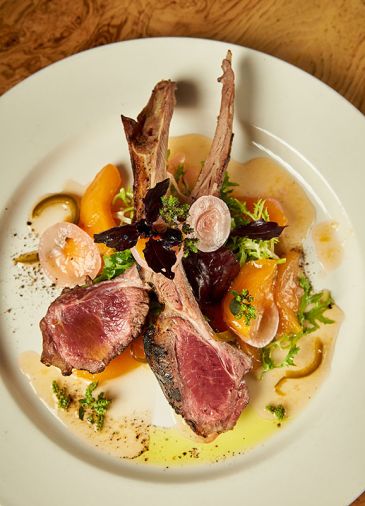 Grilled Rack of Lamb Chops feature Oregon grown lamb served with jalapeño, peach, and Cipollini onion jam.