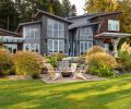 S9 Architecture and AM Interior Design recently completed this Gig Harbor home infused with nature. Exterior finishes include Porcelanosa Age Dark Nature tile and Americana Bingaman Thermally Modified Poplar siding.