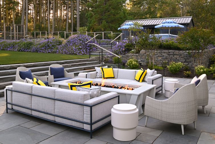 Perennials & Sutherland sofas from Seattle Design Center hug the fire pit on central fire terrace. Holly Hunt side tables from Jennifer West at SDC. Land Morphology’s custom metal work and railings coordinate with the Bluestone step railings, with all their hardware artfully concealed by Green Man Landscape and Design, who also constructed the dry stack stone walls of Whistler Basalt and sand-set the Bluestone terrace.