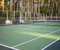 10-foot sports fencing encloses tennis courts above left.