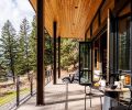 On the view side, the NanaWall opens to a covered veranda for soaking up the sun when it’s not too windy. The underside of the eaves are covered in Douglas Fir Shiplap Chanel siding, which is carried inside for continuity, and provided by North Valley Lumber. The site-built custom railings are from Johnsen Steel Works.