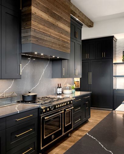 Standard TV & Appliance provided stunning Bertazzoni range, refrigerator and hood insert. Pental Sorano backsplash and countertops. Hewn rangehood by Tiffany Home Design. Sherwin Williams Drift of Mist.