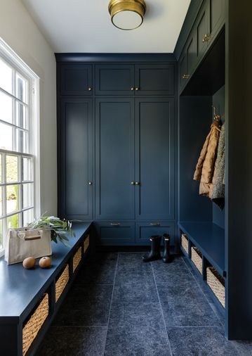 The mudroom floor is GBI Tile & Stone Belgian Petit Granit Antiqued limestone from United Tile.