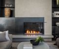 Family room fireplace and surround by Grevstad, fabricated by Decorative Metal Arts. Studio C smooth faced plaster in custom gray. Perennials area rug from Perennials & Sutherland showroom. Gray poured floating concrete hearth, V.C. Studios.