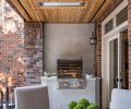 Water-damaged patio gets facelift with Infratech heaters, cedar soffit. BBQ revamp utilizes plaster surround and wall, adds concrete countertop. Edgestar grill from Ferguson. Belgian concrete and teak Restoration Hardware table and chairs.