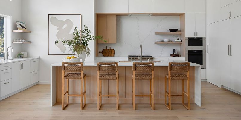 Vanillawood custom cabinetry is combined with a quartz backsplash and counters. All appliances are through Basco Appliances, plumbing through Chown Hardware.