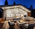 The rear of the house utilizes Marvin windows and La Cantina doors from Medallion Industries Inc. to create easy indoor-outdoor flow.