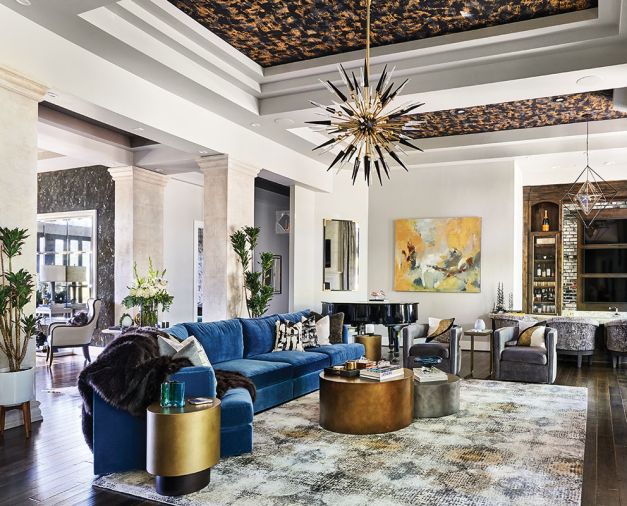 Sparta and Bar Chandeliers by Hudson Valley Lighting. Bravura Finishes ceiling and entry treatments using paint from Brush & Trowel. Burnished Jaipur Kaleida rug echoes Sunpan coffee tables. Bernhardt sofa.