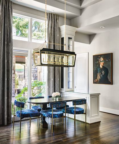 Windows from Parr Lumber shine on new dark Kentwood flooring. Visual Comfort Caddo Large Linear Lantern. S Harris chairs covered in Borneo Jewel fabric.